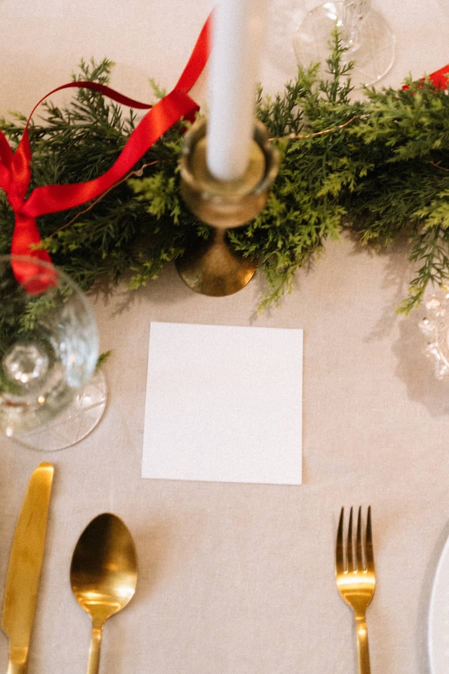 a table set for Christmas dinner